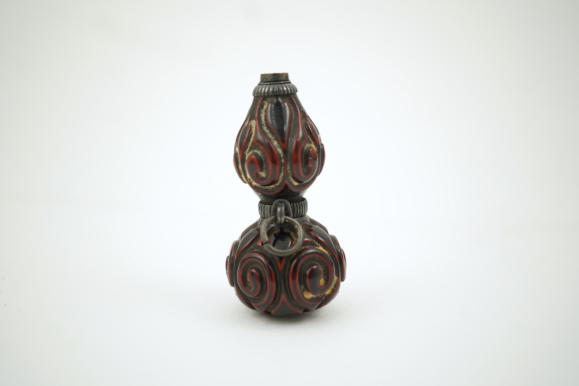 A Japanese guribori lacquer double gourd shaped netsuke, Edo period, late 18th/early 19th century